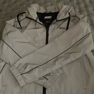 DKNY hooded sport jacket with reflective coating and two side pockets Size Med